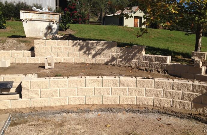 Retaining & Retention Walls-Grand Prairie TX Landscape Designs & Outdoor Living Areas-We offer Landscape Design, Outdoor Patios & Pergolas, Outdoor Living Spaces, Stonescapes, Residential & Commercial Landscaping, Irrigation Installation & Repairs, Drainage Systems, Landscape Lighting, Outdoor Living Spaces, Tree Service, Lawn Service, and more.